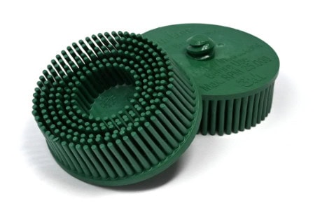 Two bristle discs designed for surface cleaning and finishing applications.