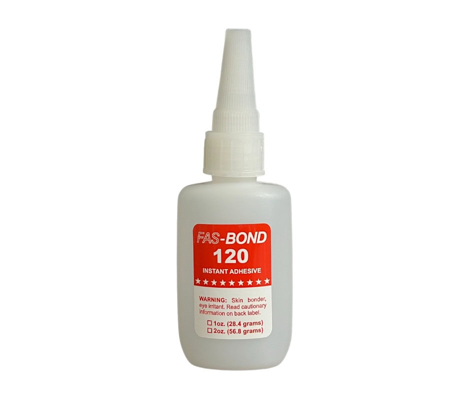 A bottle of FAS-BOND 120 instant adhesive, designed for fast bonding and repairs.